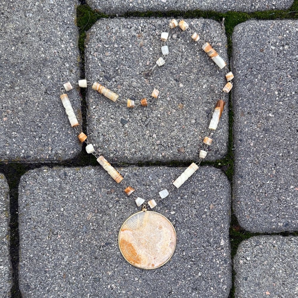 Beaded Necklace with Gold Aztec Pendant
